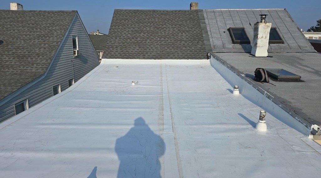 Commercial roofing crew on site